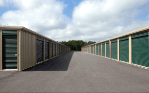 Row of outdoor storage units showing the importance of self storage security cameras to protect tenant property and facility operations